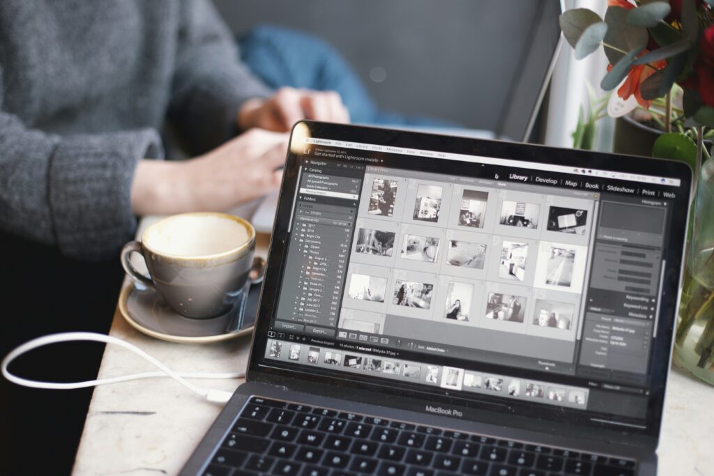 Client reviewing curated artwork options with photographer on Zoom